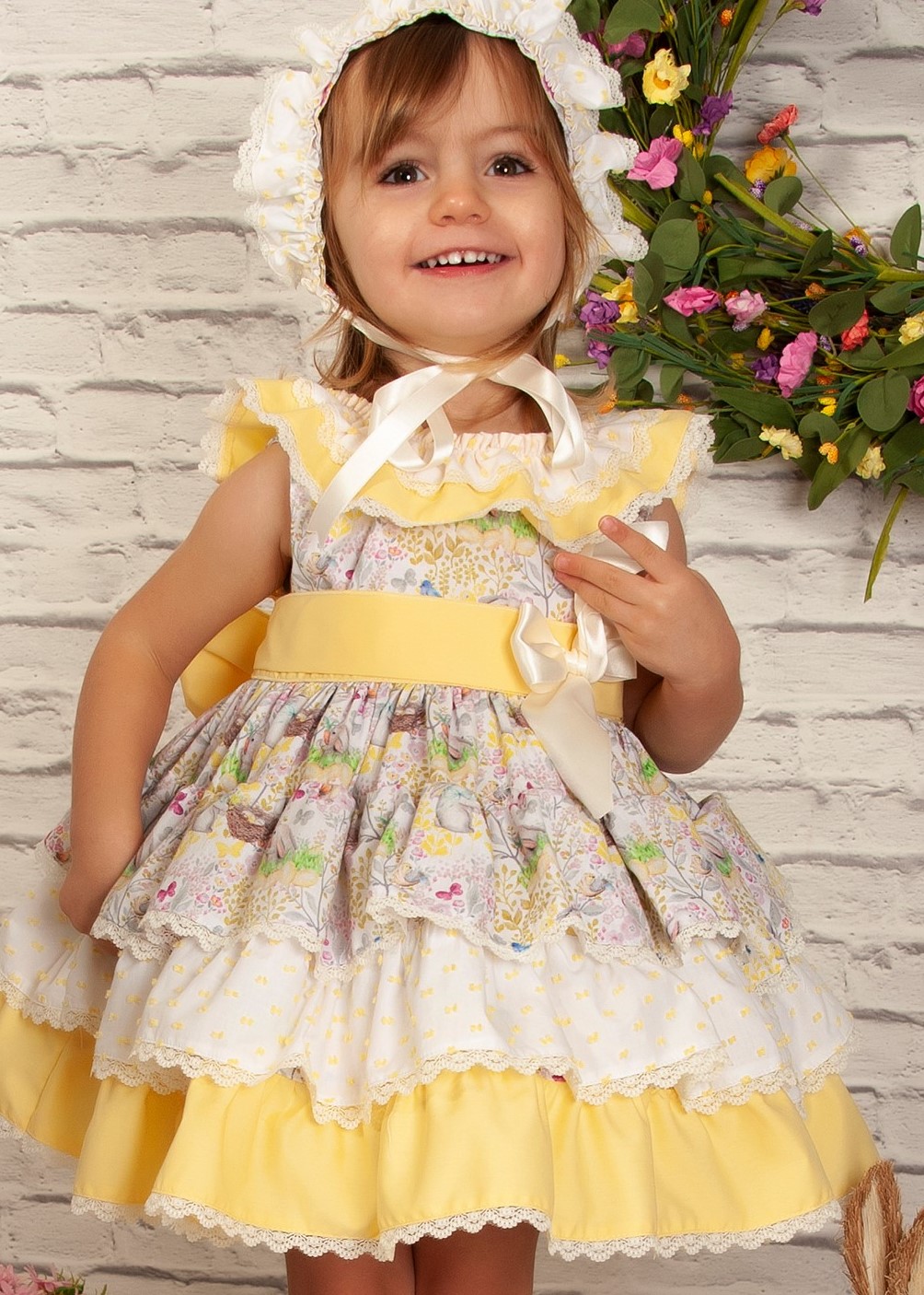 VE22-05 yellow tiered Easter dress with bonnet, front